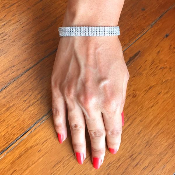 model wearing three line cz zircon bracelet in pure 925 sterling silver