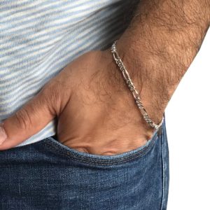 model wearing ultra thin silver chain bracelet in pure 925 silver