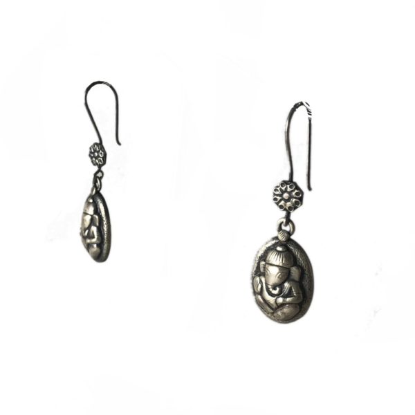 side view of oval sterling silver ganesha earrings