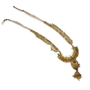 closeup of jadau gold plated silver necklace for weddings
