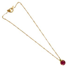full view of chain and pendant set with corundum and emerald in sterling silver