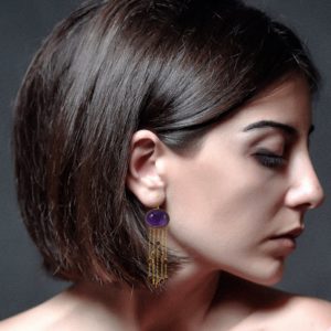 model wearing gold plated amethyst gemstone earrings