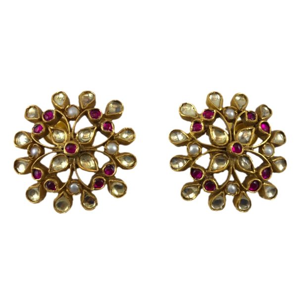 jadau gold plated silver earrings set with crystals pearls and red stones