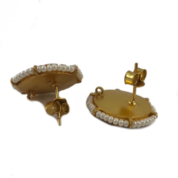 reverse of jadau gold plated silver earrings