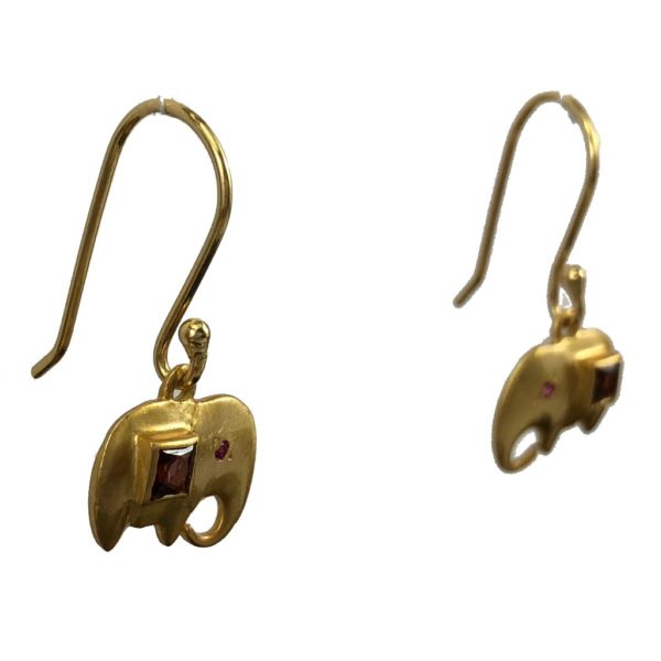 sideview of small gold plated silver elephant earrings set with garnets
