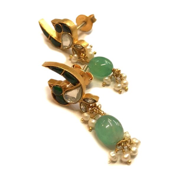 jadau gold plated bird earrings with onyx and pearl hangings in sterling silver